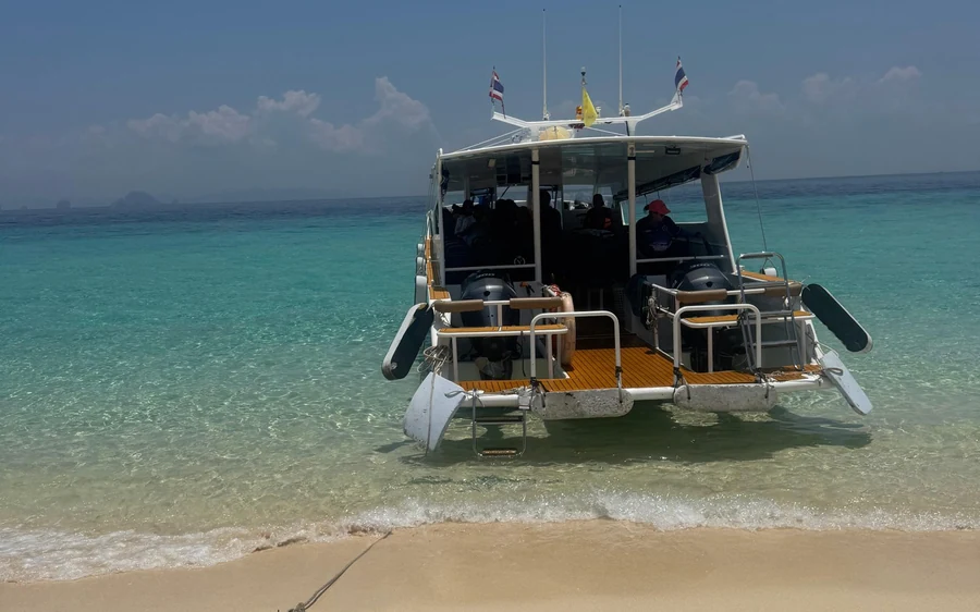 A premium speed catamaran on the Andaman Sea near Phi Phi