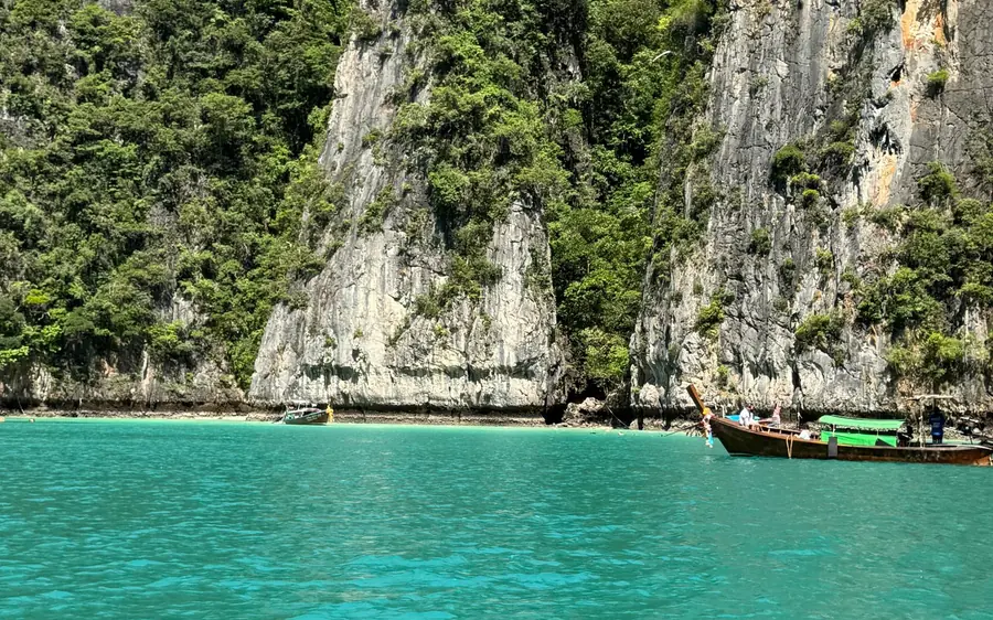 A speed catamaran anchored off Bamboo Island